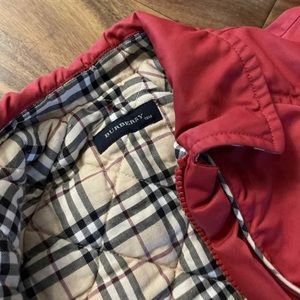Red Burberry coat